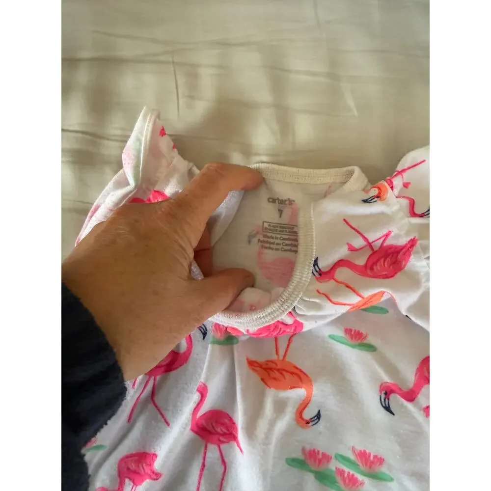 Carters purple rollar skate and white flamingo pajamas size 7 an 8